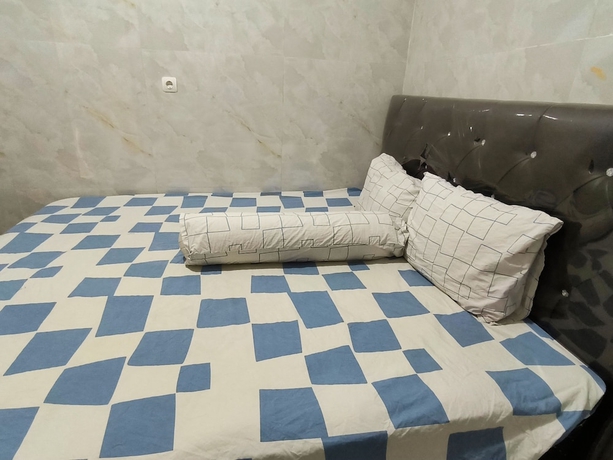 Imagen de la habitación del Hotel Trikora Guesthouse Syariah 2. Foto 10