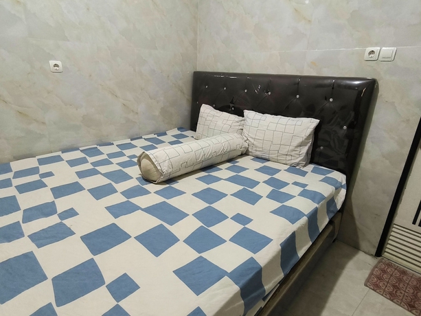 Imagen de la habitación del Hotel Trikora Guesthouse Syariah 2. Foto 12