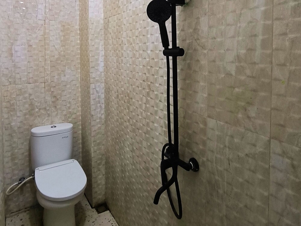 Imagen de la habitación del Hotel Trikora Guesthouse Syariah 2. Foto 14