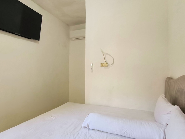 Imagen de la habitación del Hotel Trikora Guesthouse Syariah 3. Foto 7
