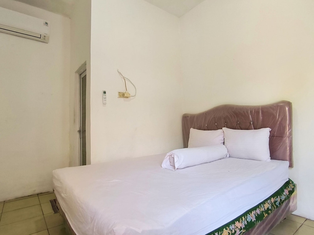Imagen de la habitación del Hotel Trikora Guesthouse Syariah 3. Foto 9