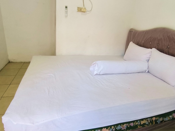Imagen de la habitación del Hotel Trikora Guesthouse Syariah 3. Foto 11