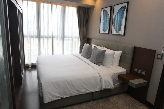 Imagen de la habitación del Hotel Trillion Suites By Slg. Foto 3