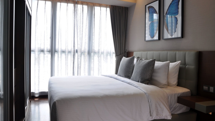 Imagen de la habitación del Hotel Trillion Suites By Slg. Foto 4