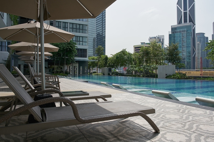 Imagen de la piscina del Hotel Trillion Suites By Slg. Foto 18