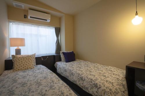Imagen de la habitación del Hotel Trim, Kanazawa. Foto 9
