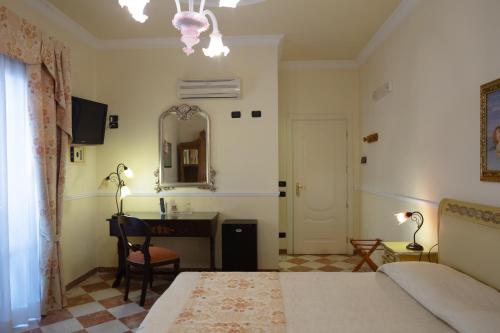 Imagen de la habitación del Hotel Trinacria. Foto 14