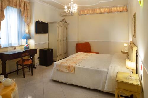 Imagen de la habitación del Hotel Trinacria. Foto 15