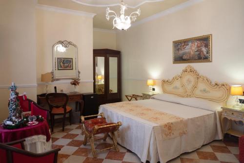 Imagen de la habitación del Hotel Trinacria. Foto 17