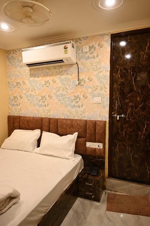 Imagen de la habitación del Hotel Trinetra Homestay. Foto 2