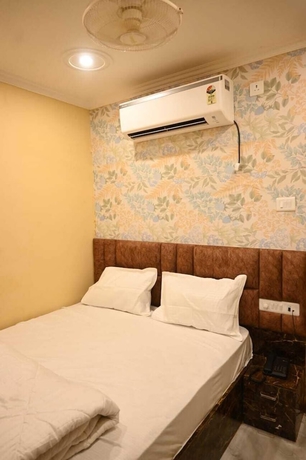 Imagen de la habitación del Hotel Trinetra Homestay. Foto 3