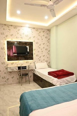 Imagen de la habitación del Hotel Trinetra Homestay. Foto 6