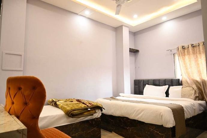 Imagen de la habitación del Hotel Trinetra Homestay. Foto 7