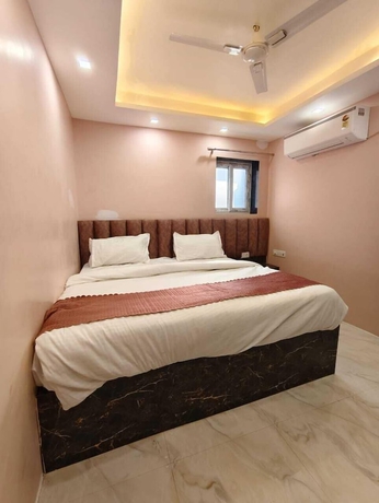 Imagen de la habitación del Hotel Trinetra Homestay. Foto 8