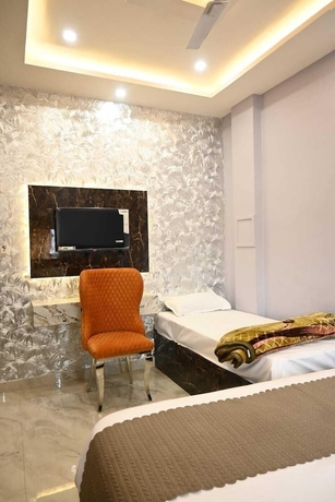 Imagen de la habitación del Hotel Trinetra Homestay. Foto 14