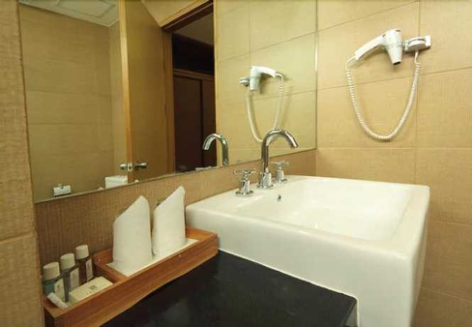 Imagen de la habitación del Hotel Triniti Jakarta. Foto 6