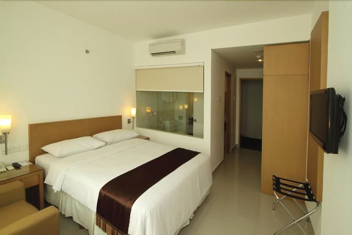 Imagen de la habitación del Hotel Triniti Jakarta. Foto 9
