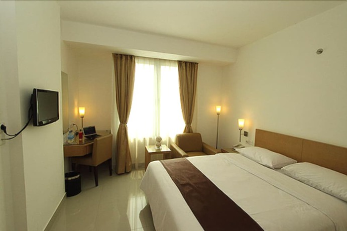 Imagen de la habitación del Hotel Triniti Jakarta. Foto 13