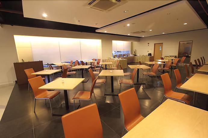 Imagen del bar/restaurante del Hotel Triniti Jakarta. Foto 5