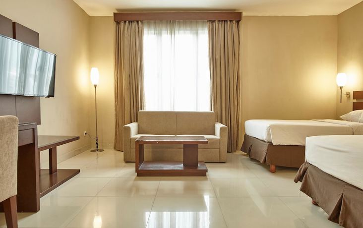 Imagen de la habitación del Hotel Triniti Jakarta. Foto 15