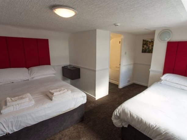 Imagen de la habitación del Hotel Trinity Guest House. Foto 3