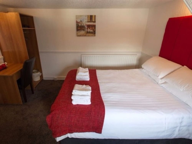Imagen de la habitación del Hotel Trinity Guest House. Foto 6
