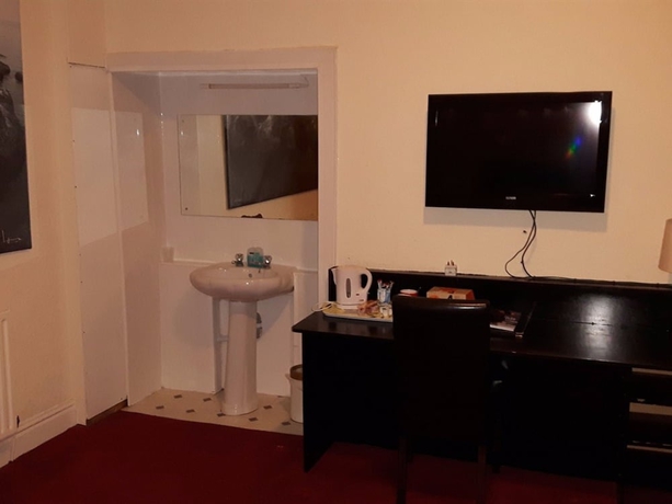 Imagen de la habitación del Hotel Trinity Guest House. Foto 11