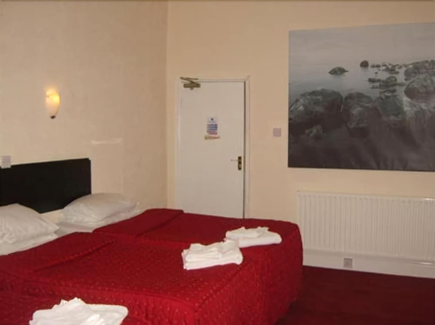 Imagen de la habitación del Hotel Trinity Guest House. Foto 13