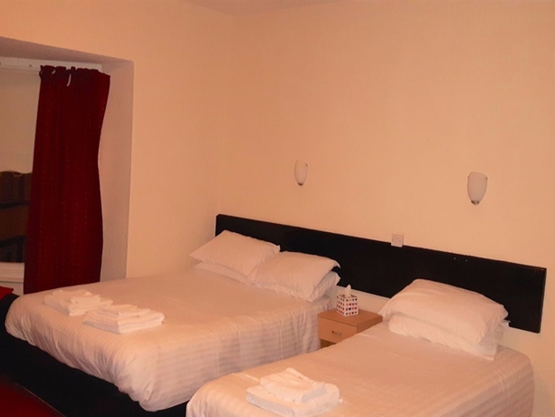 Imagen de la habitación del Hotel Trinity Guest House. Foto 15