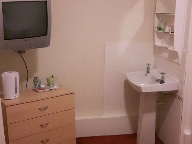 Imagen de la habitación del Hotel Trinity Guest House. Foto 16