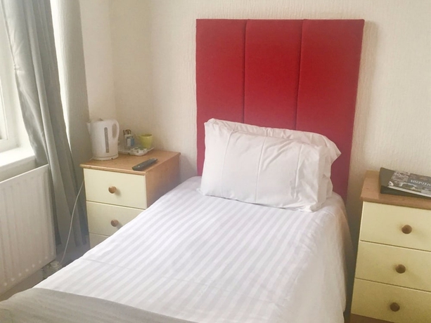 Imagen de la habitación del Hotel Trinity Guest House. Foto 18