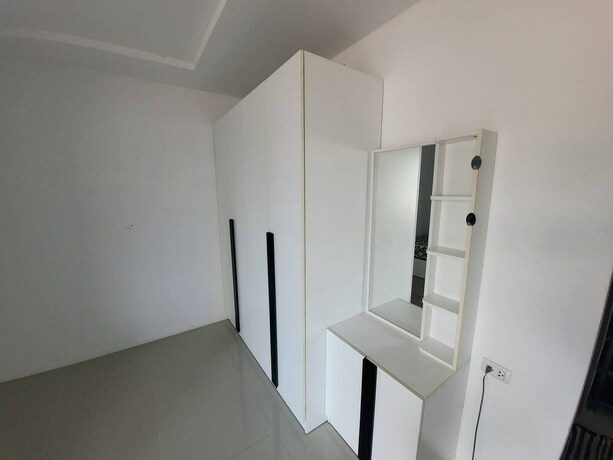 Imagen general del Hotel Trio Gems Condo Beach. Foto 7