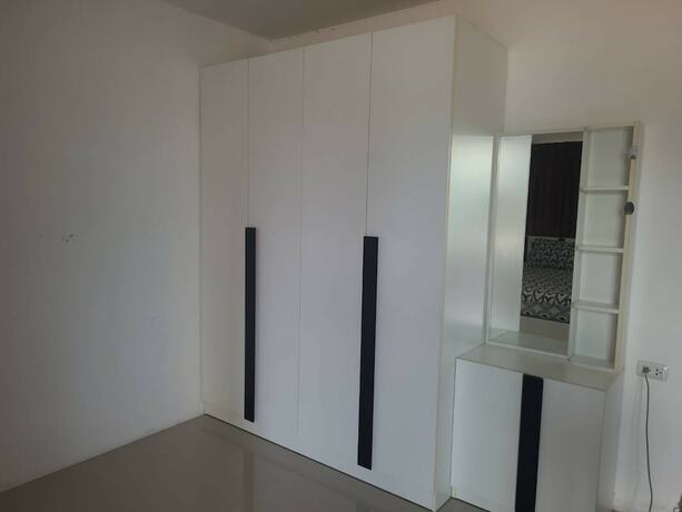 Imagen general del Hotel Trio Gems Condo Beach. Foto 10