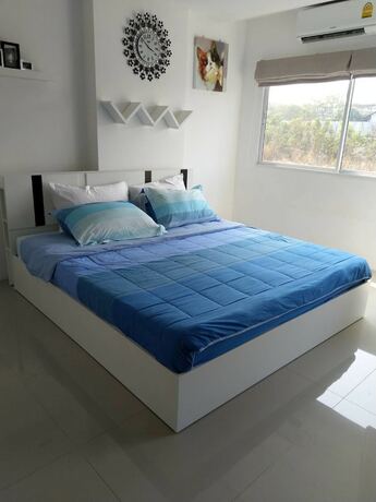 Imagen de la habitación del Hotel Trio Gems Condo Beach. Foto 22