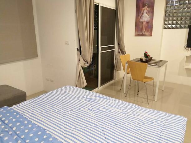 Imagen de la habitación del Hotel Trio Gems Condo Beach. Foto 23