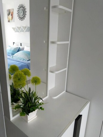 Imagen de la habitación del Hotel Trio Gems Condo Beach. Foto 24