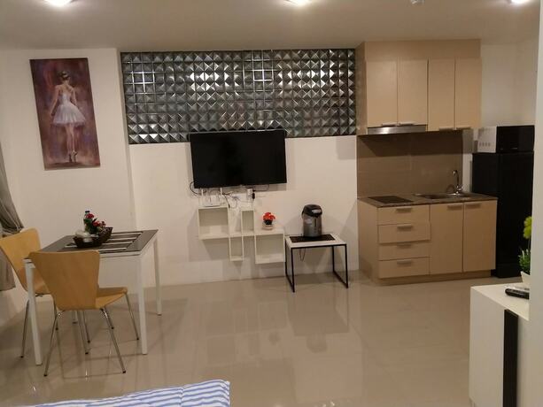 Imagen de la habitación del Hotel Trio Gems Condo Beach. Foto 29