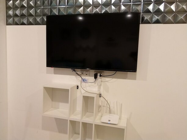 Imagen de la habitación del Hotel Trio Gems Condo Beach. Foto 30