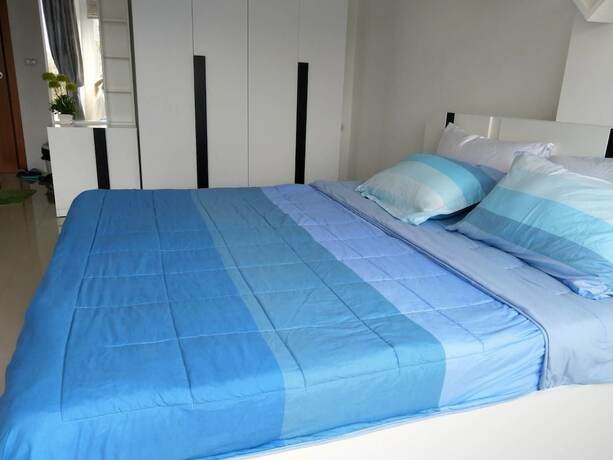 Imagen de la habitación del Hotel Trio Gems Condo Beach. Foto 34