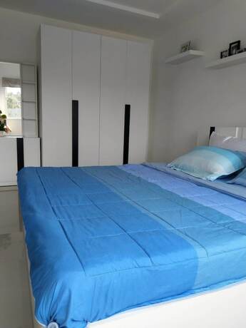 Imagen de la habitación del Hotel Trio Gems Condo Beach. Foto 35