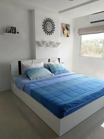 Imagen de la habitación del Hotel Trio Gems Condo Beach. Foto 36