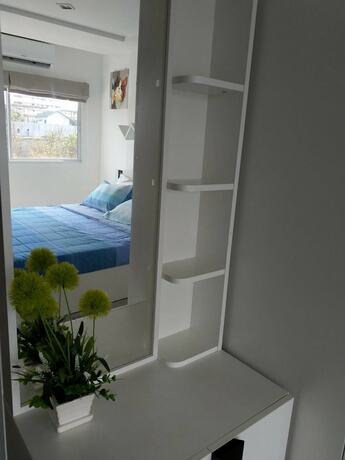 Imagen de la habitación del Hotel Trio Gems Condo Beach. Foto 39