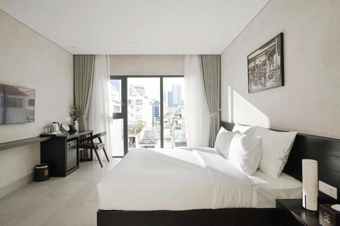 Imagen de la habitación del Hotel Triple E Metro Ben Thanh. Foto 5