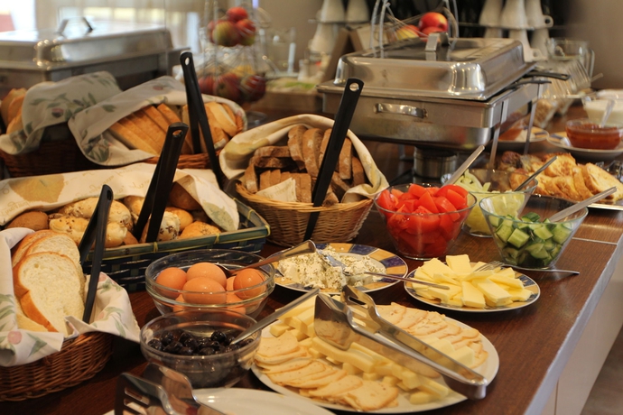 Imagen del bar/restaurante del Hotel Triple M. Foto 2