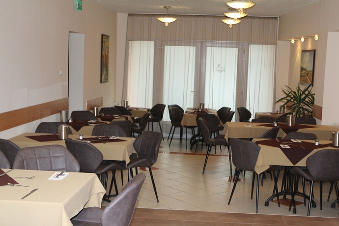 Imagen del bar/restaurante del Hotel Triple M. Foto 6