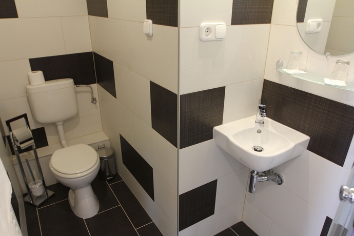 Imagen de la habitación del Hotel Triple M. Foto 11