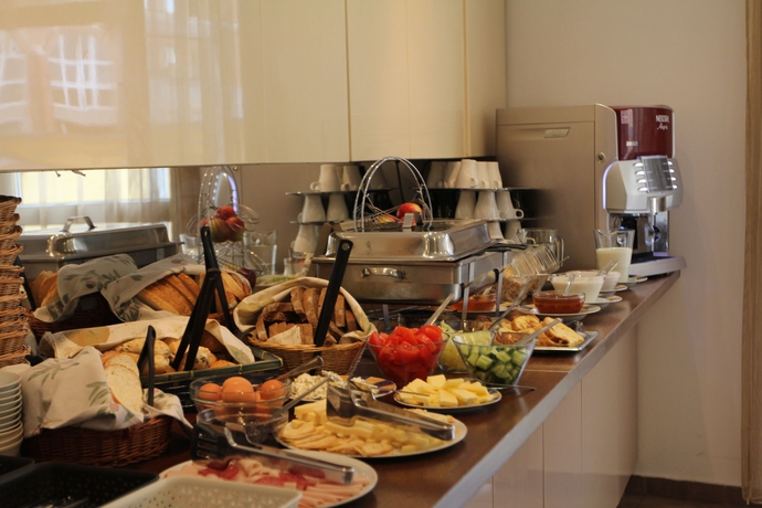 Imagen del bar/restaurante del Hotel Triple M. Foto 8