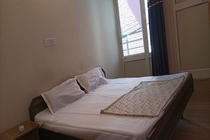 Imagen de la habitación del Hotel Triple One Hostels Ands. Foto 7