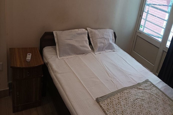 Imagen de la habitación del Hotel Triple One Hostels Ands. Foto 16
