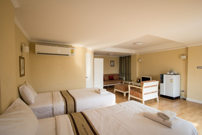 Imagen de la habitación del Hotel Triple Palms House. Foto 3